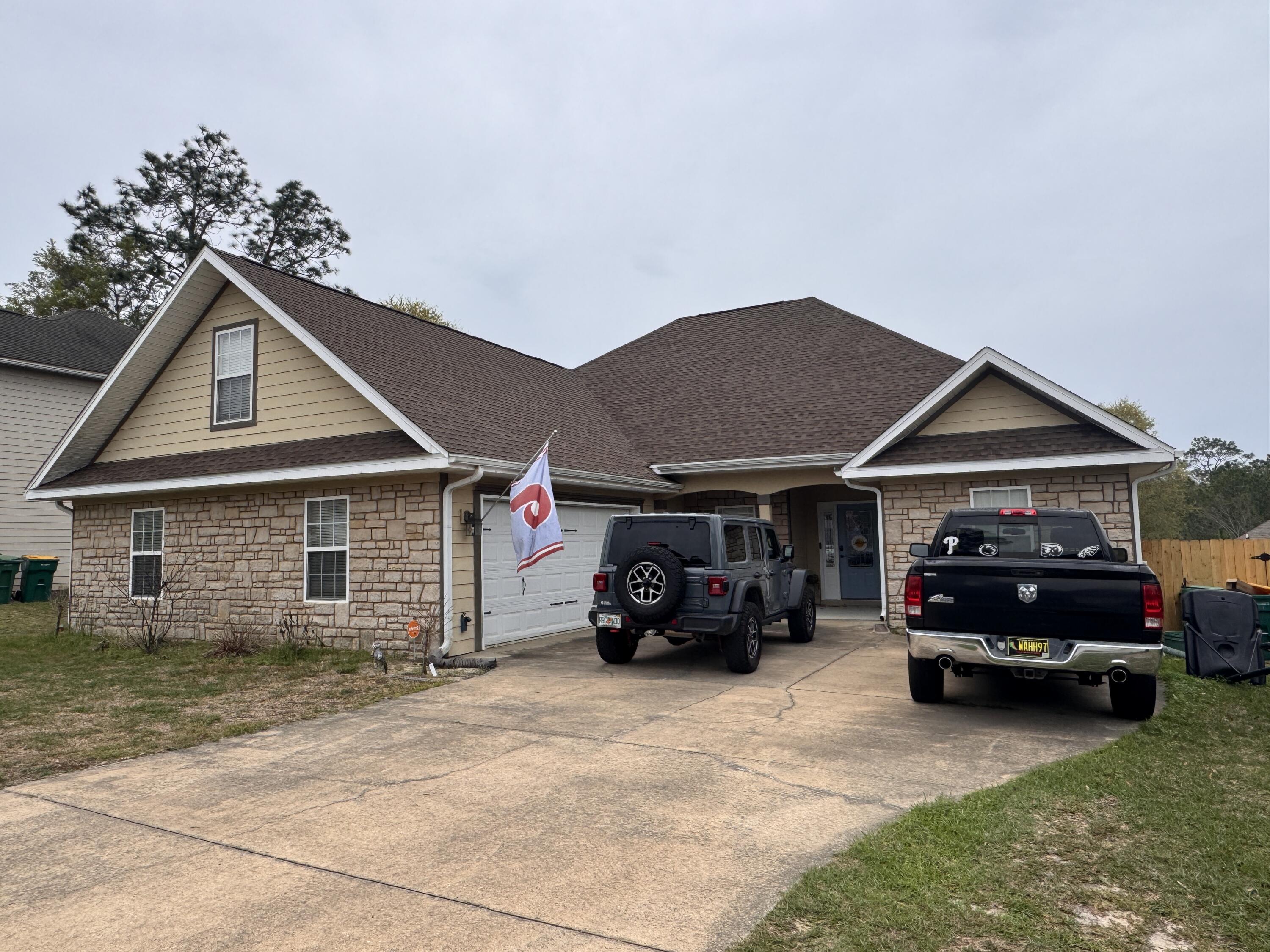 4413 Mirada Way Crestview, FL 32539 - Photo 1 of 27 a car parked in front of house