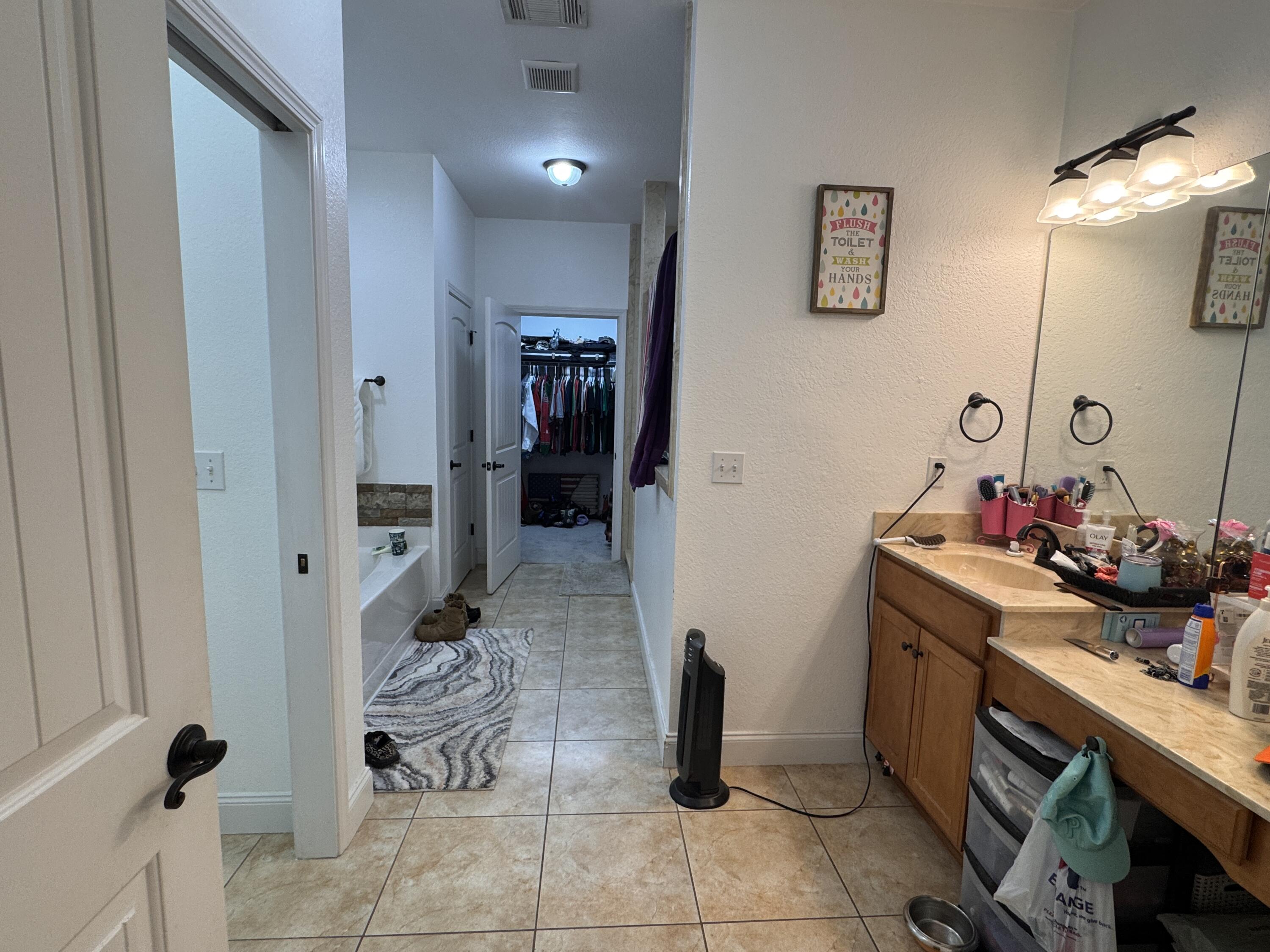 4413 Mirada Way Crestview, FL 32539 - Photo 11 of 27 a room with cabinets and gym equipment