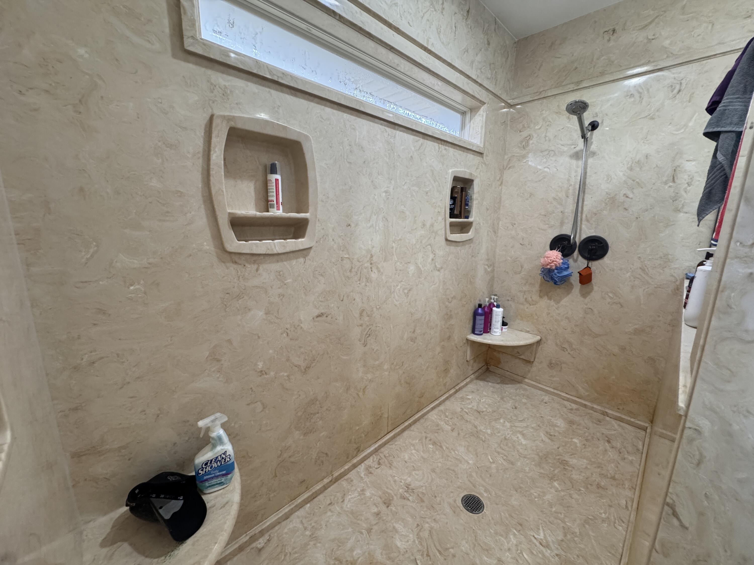 4413 Mirada Way Crestview, FL 32539 - Photo 14 of 27 a bathroom with a shower