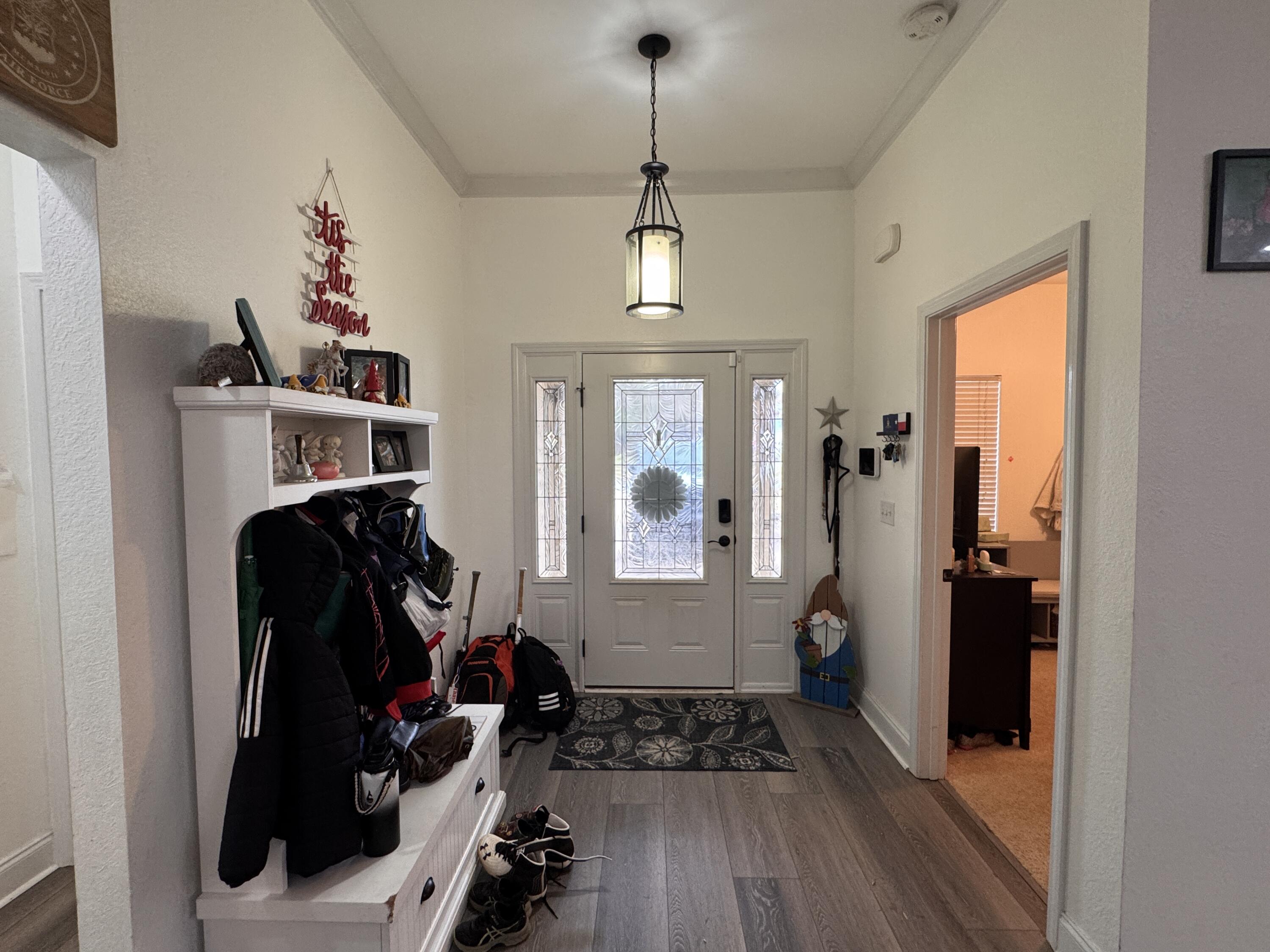 4413 Mirada Way Crestview, FL 32539 - Photo 2 of 27 a view of a entryway with furniture and closet