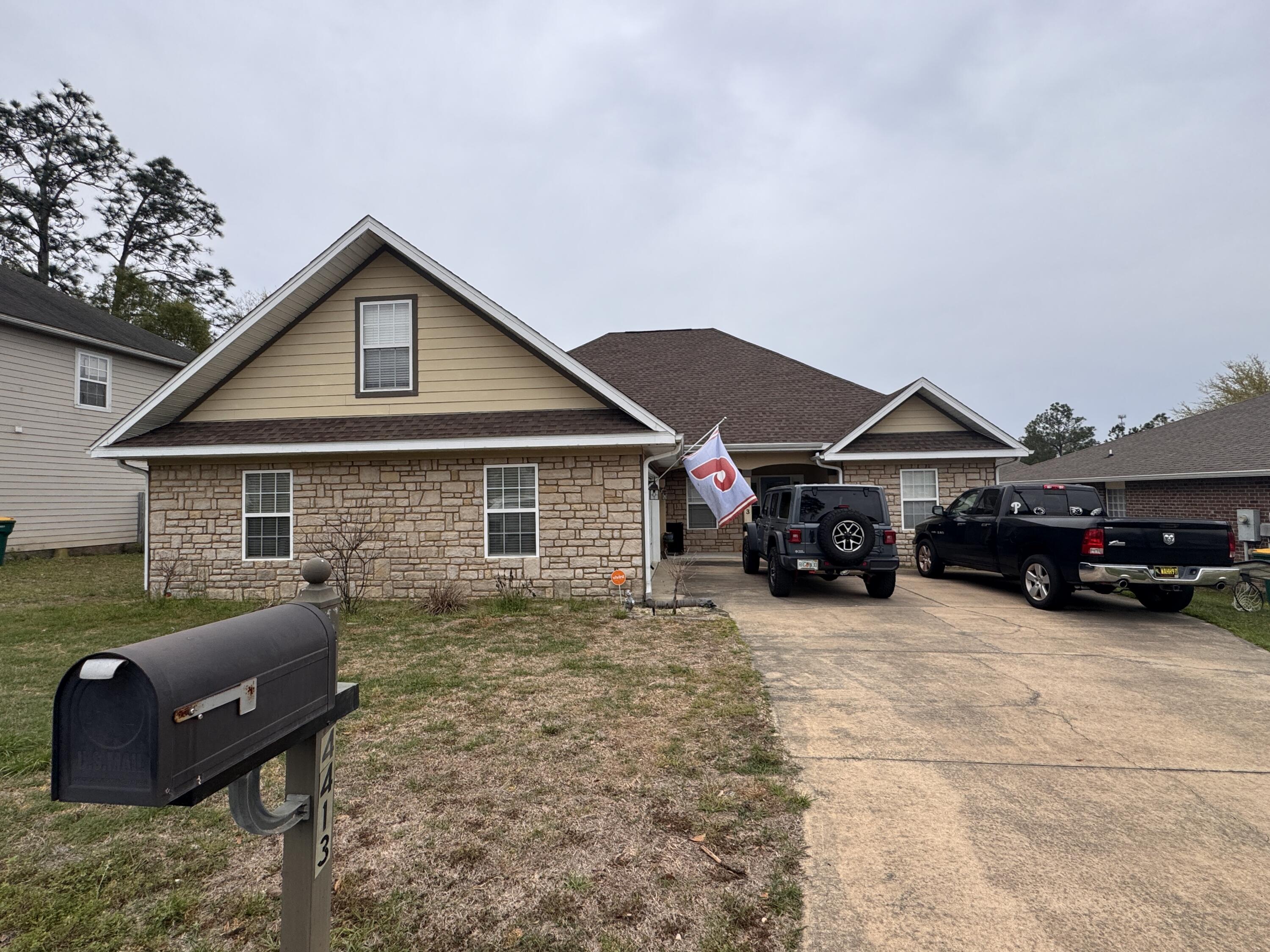 4413 Mirada Way Crestview, FL 32539 - Photo 25 of 27 a view of car parked in front of house