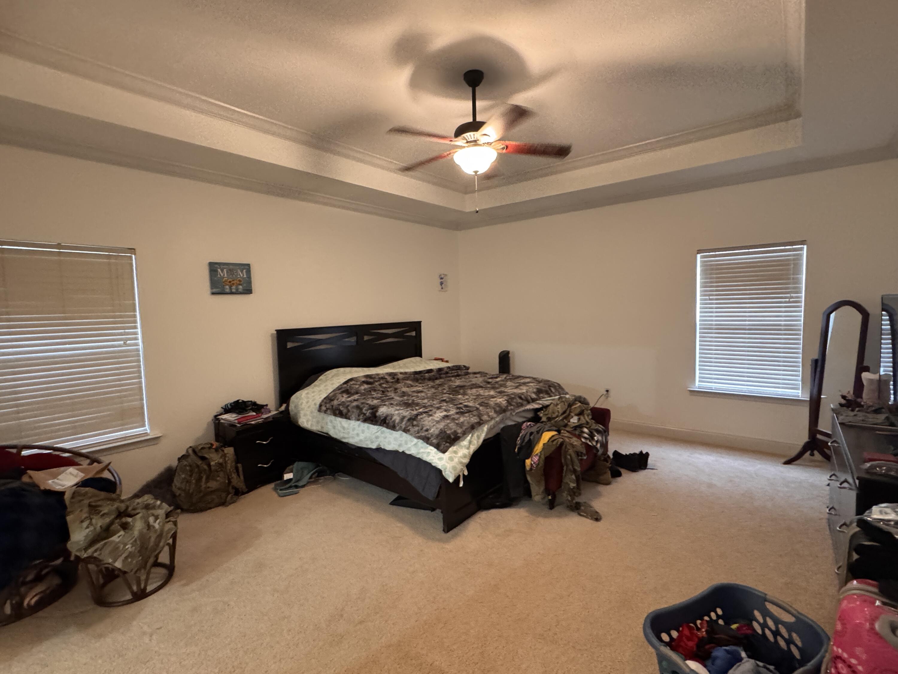 4413 Mirada Way Crestview, FL 32539 - Photo 9 of 27 a bedroom with a bed and window