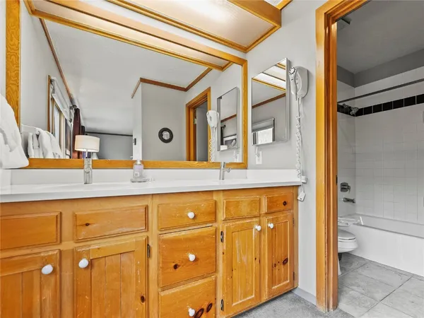 a view of entryway with a door and a shower