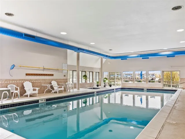 a kitchen with stainless steel appliances granite countertop a sink and a stove