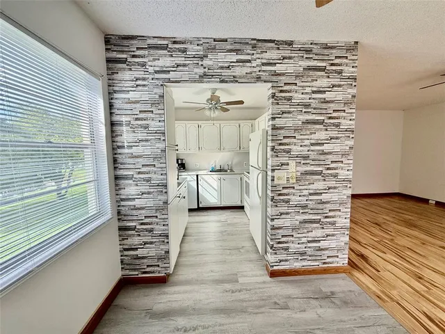 a room with lots of chairs and washer