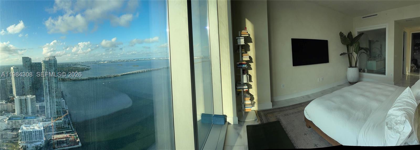700 Northeast 26th Terrace, Unit 5006 Miami, FL 33137 - Photo 10 of 18 a bathroom with a glass shower door