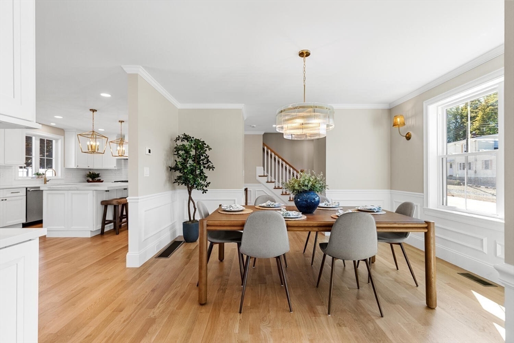 199 Nahant Street Wakefield, MA 01880 - Photo 14 of 39 a view of a dining room with furniture window and wooden floor