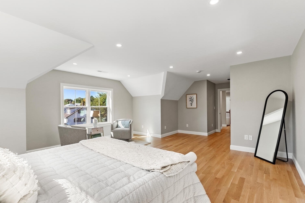 199 Nahant Street Wakefield, MA 01880 - Photo 20 of 39 a bedroom with a bed and a large window