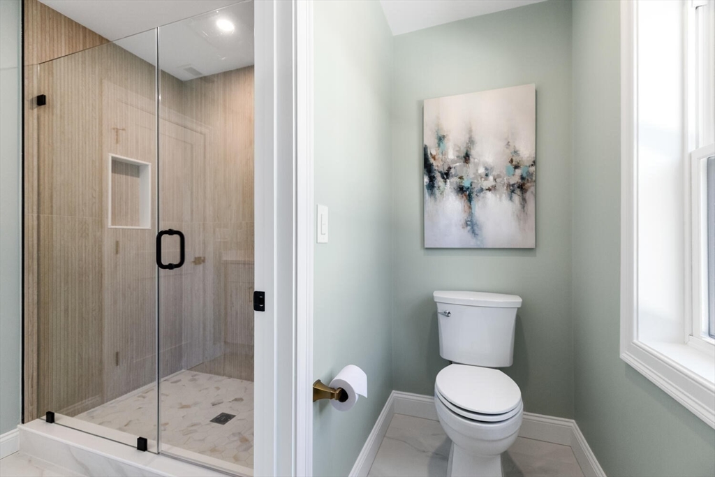 199 Nahant Street Wakefield, MA 01880 - Photo 22 of 39 a bathroom with a toilet sink and shower