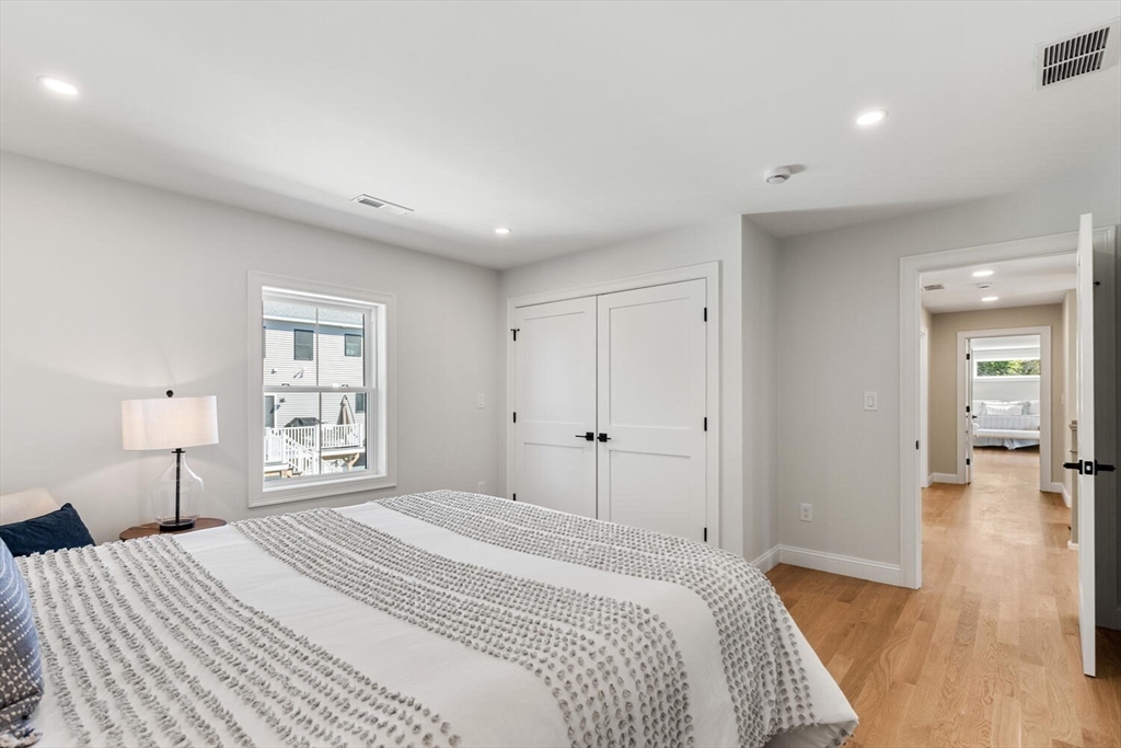 199 Nahant Street Wakefield, MA 01880 - Photo 24 of 39 a bedroom with a bed and a window