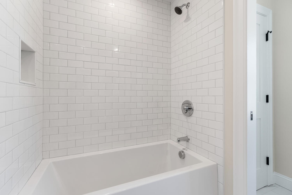 199 Nahant Street Wakefield, MA 01880 - Photo 26 of 39 a bathroom with a bathtub