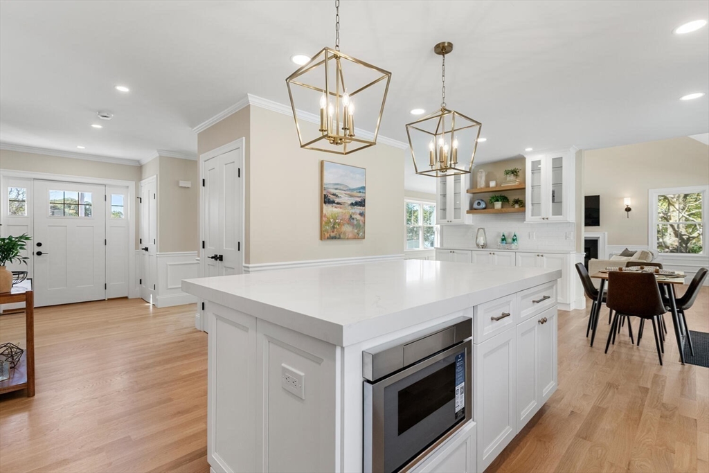 199 Nahant Street Wakefield, MA 01880 - Photo 6 of 39 a kitchen with a stove a sink and a refrigerator