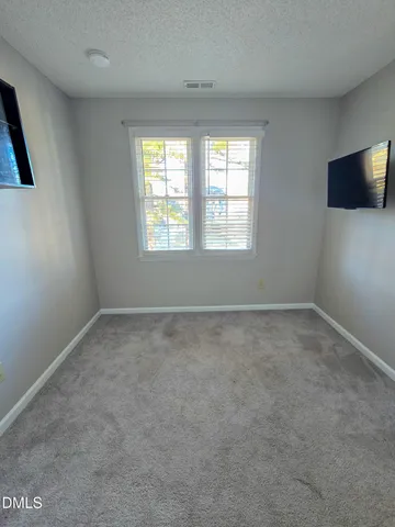 an empty room with an entryway