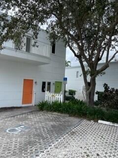 477 Southeast Riverside Drive Stuart, FL 34994 - Photo 6 of 7 a front view of a house with yard