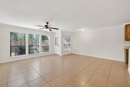 4502 Mallow Street, Unit B Houston, TX 77051 - Photo 14 of 28 Full view of the living room. Showing plenty of light. entire 1st floor is tile.