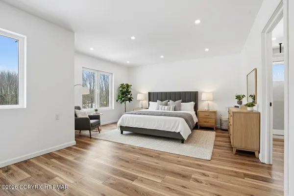 a view of a house with a backyard and a large window