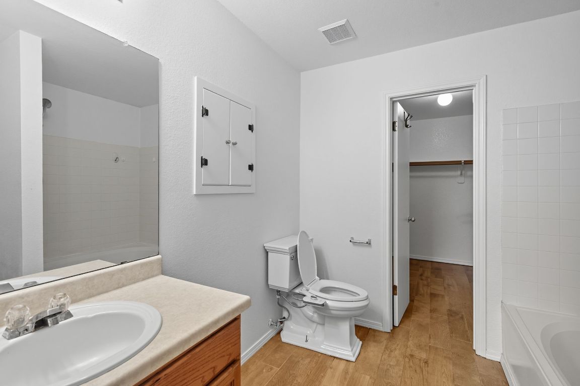 617 Riverway Lane Leander, TX 78641 - Photo 16 of 33 a bathroom with a sink toilet and shower