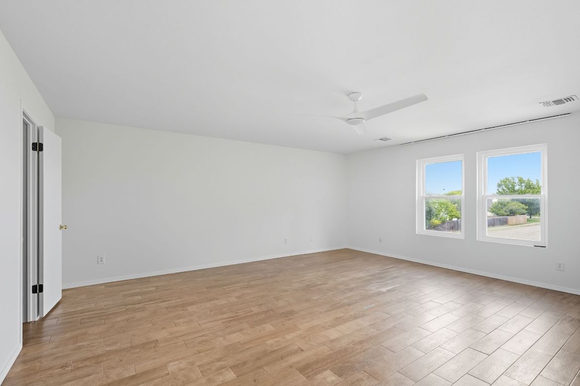 617 Riverway Lane Leander, TX 78641 - Photo 25 of 33 an empty room with windows