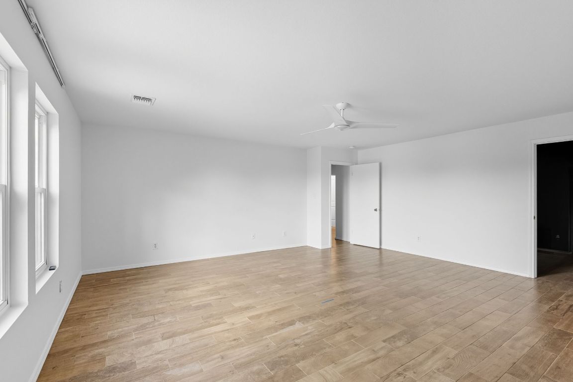 617 Riverway Lane Leander, TX 78641 - Photo 26 of 33 a view of an empty room with a window