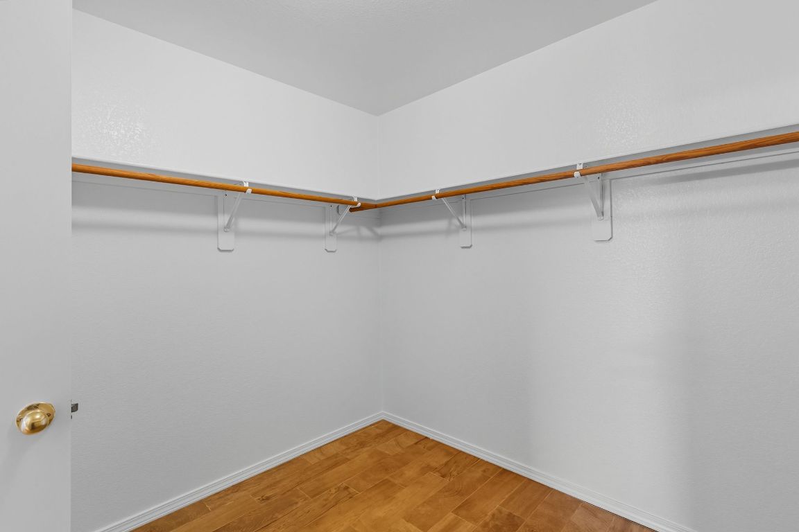 617 Riverway Lane Leander, TX 78641 - Photo 27 of 33 a view of a room with racks on the wall