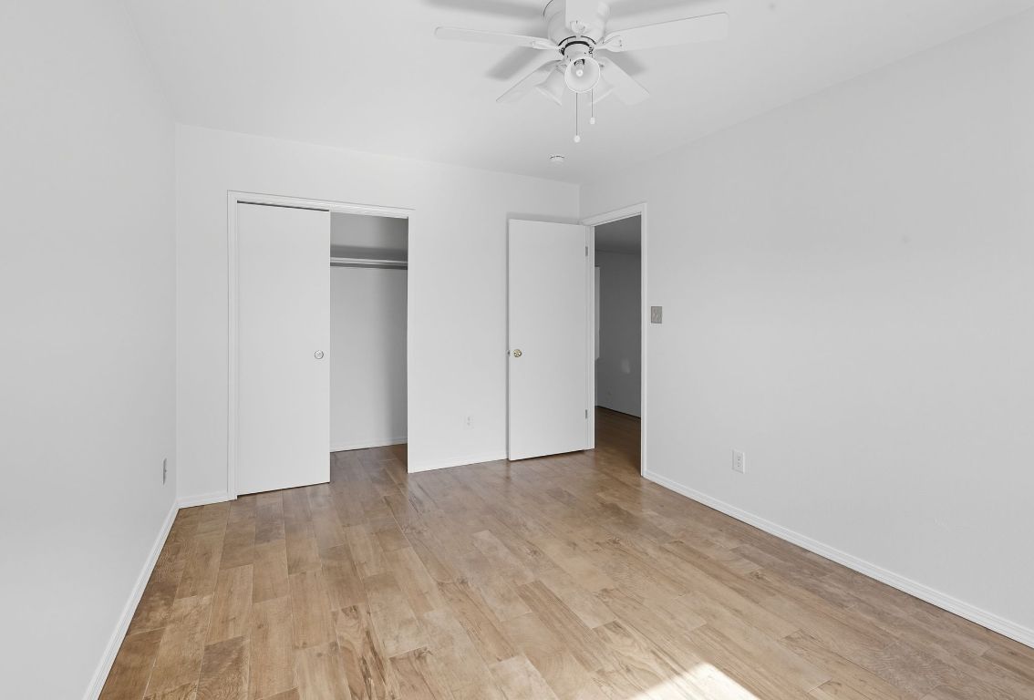 617 Riverway Lane Leander, TX 78641 - Photo 29 of 33 a view of an empty room with wooden floor