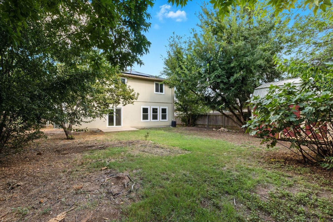 617 Riverway Lane Leander, TX 78641 - Photo 3 of 33 a view of a house with yard and a tree