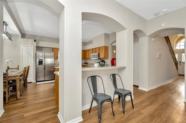 a view of dining room and wooden floor