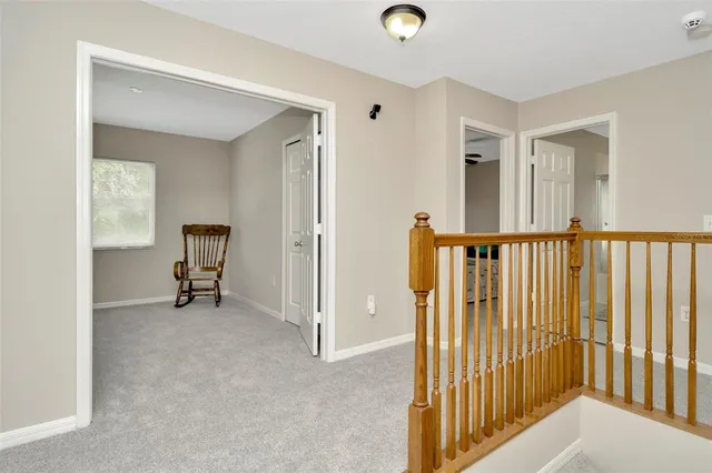 a view of a hallway with a window