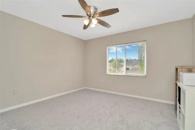 an empty room that has a window