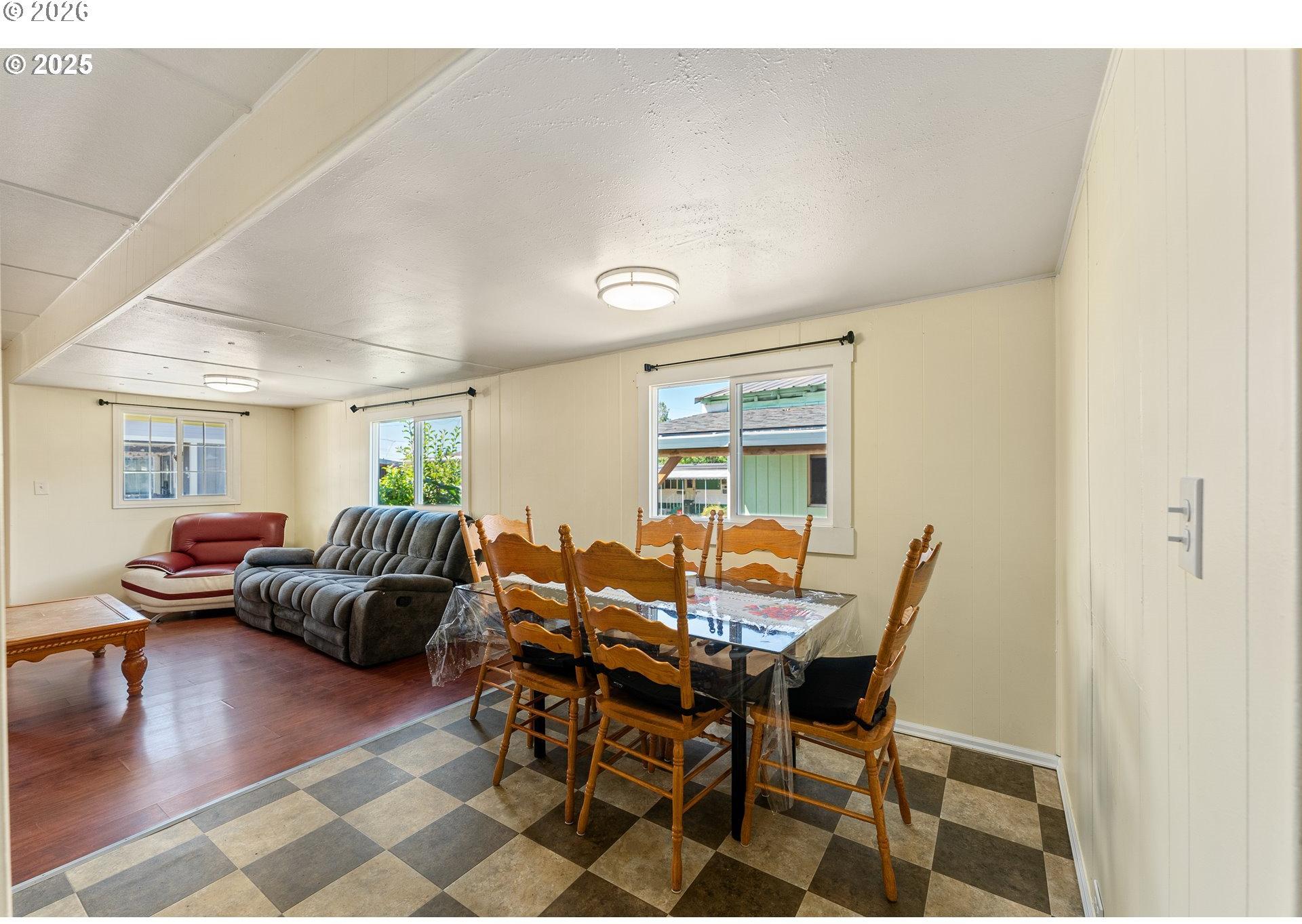 8951 Southeast Fuller Road, Unit 7 Happy Valley, OR 97086 - Photo 4 of 24 Living Room/Dining Room