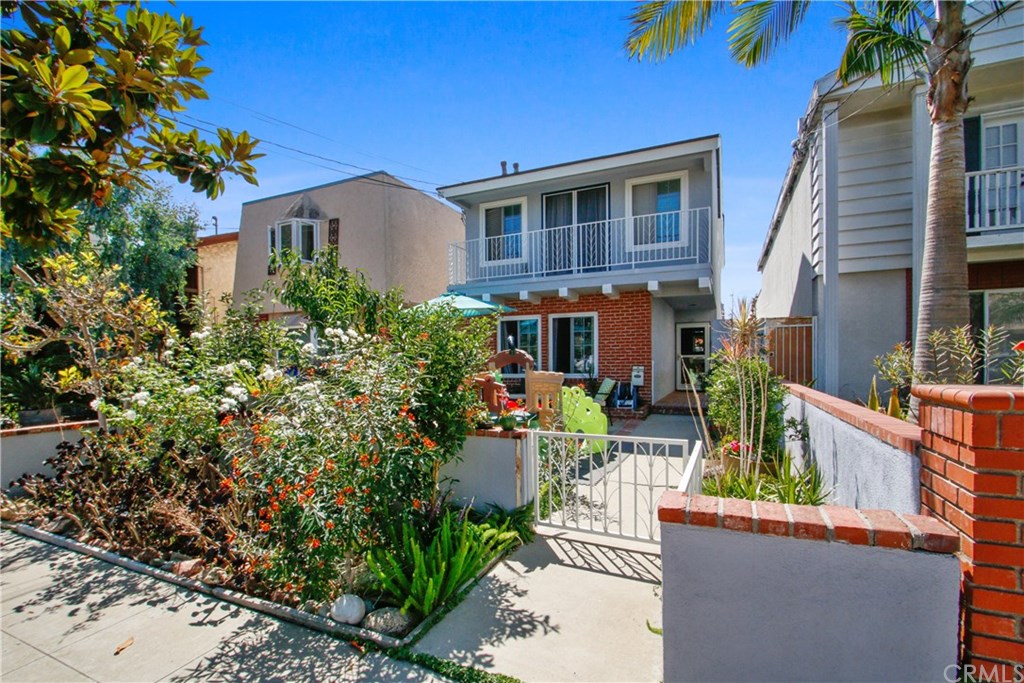 335 Flint Avenue Long Beach, CA 90814 - Photo 1 of 3 front view of a house with a small yard