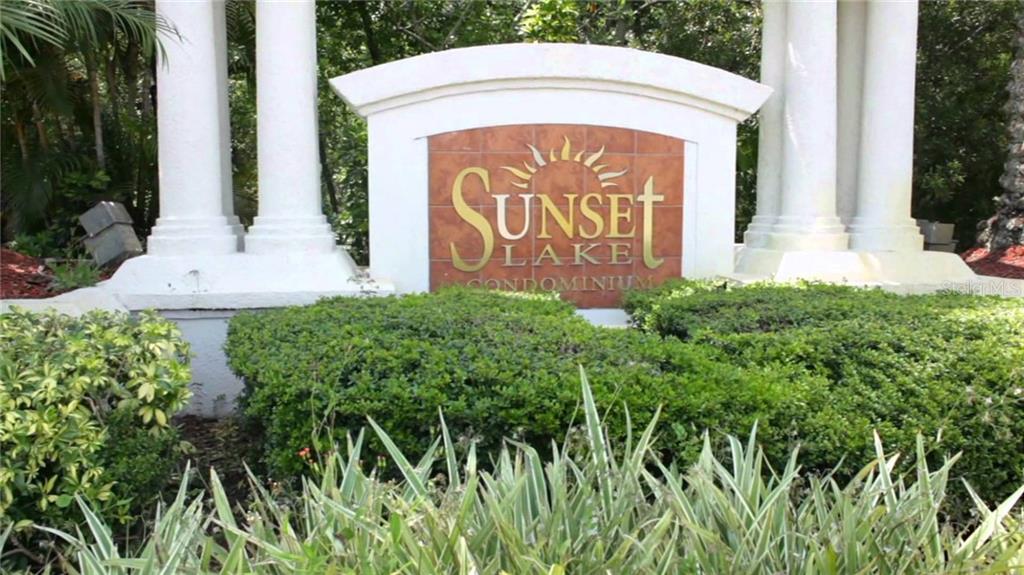 4352 South Kirkman Road, Unit 1214 Orlando, FL 32811 - Photo 1 of 1 a sign on the side of the road