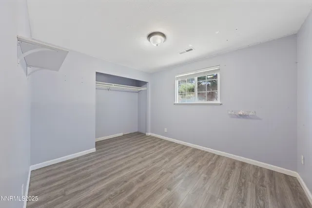 an aerial view of a house with swimming pool