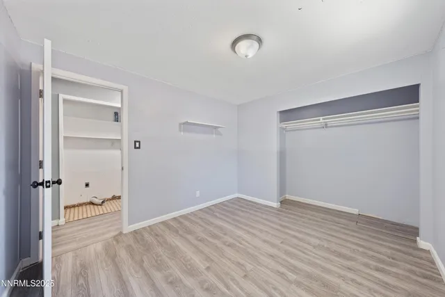 an aerial view of residential houses and outdoor space