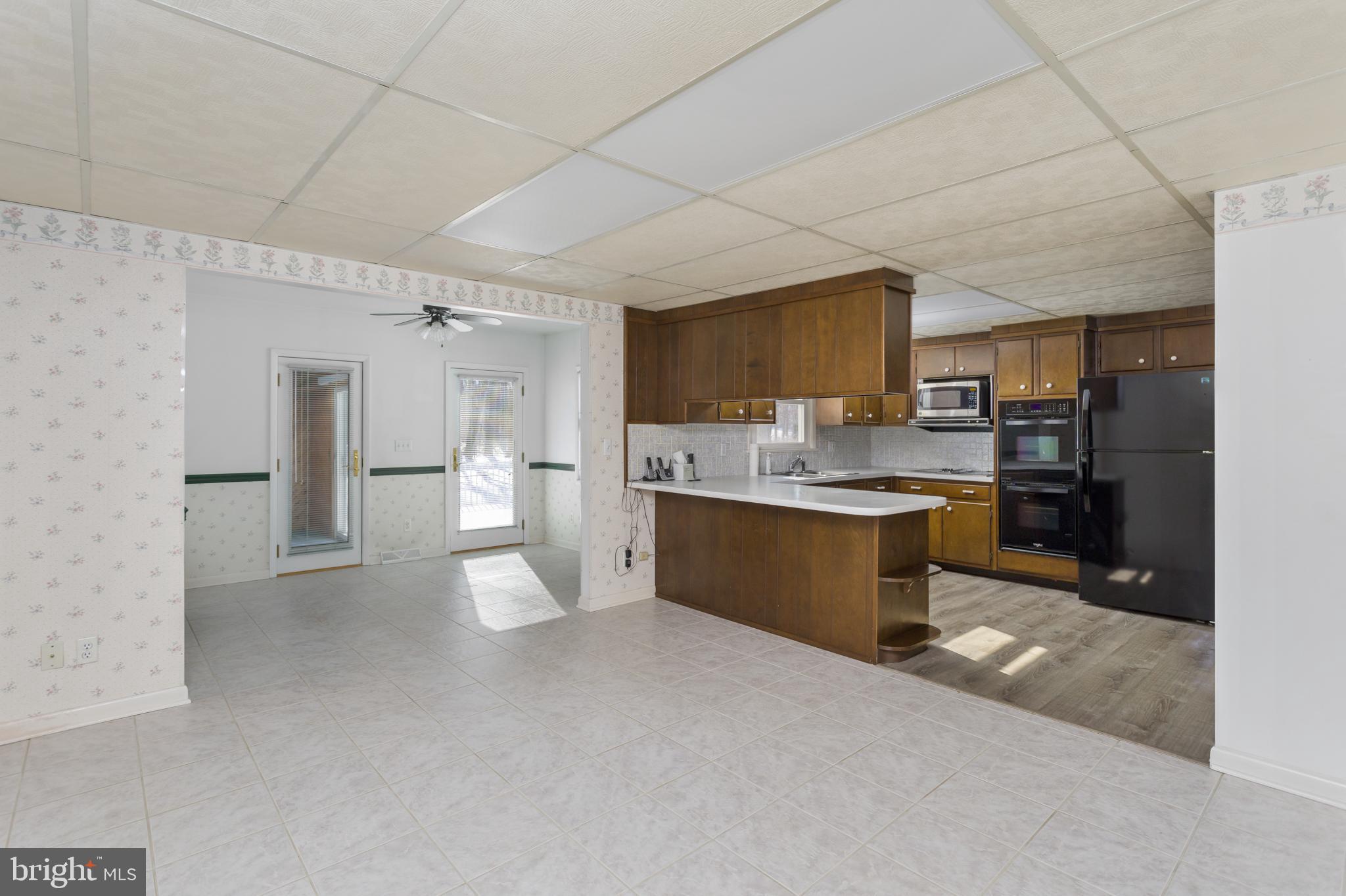 62 Tindall Road Robbinsville, NJ 08691 - Photo 11 of 21 a large kitchen with a lot of counter space and stainless steel appliances