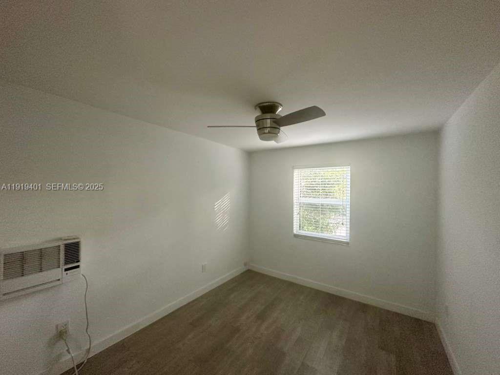 1150 Southwest 22nd Street, Unit 1 Miami, FL 33129 - Photo 9 of 13 a view of an empty room and window