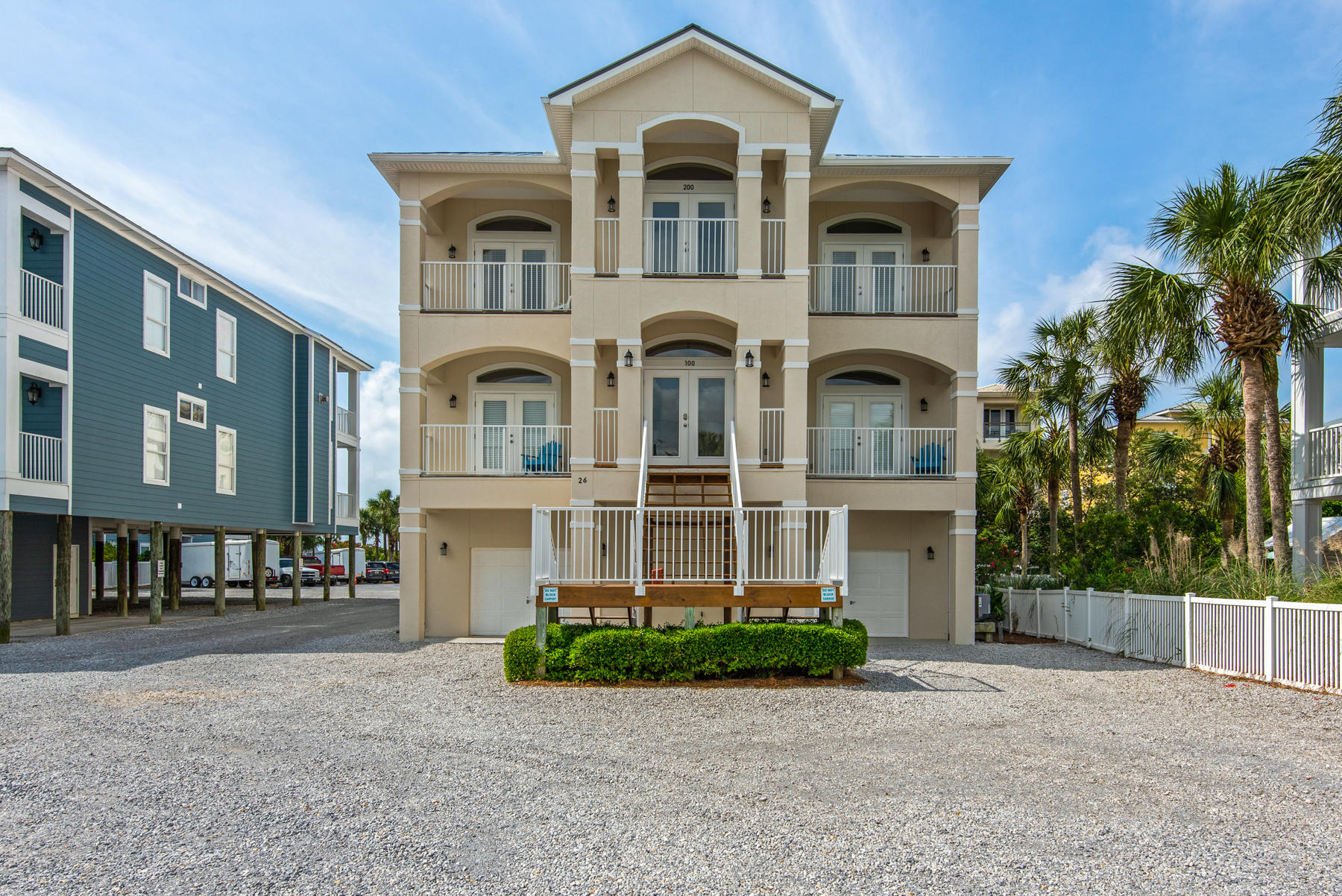 26 Nature Way, Unit 2004 Santa Rosa Beach, FL 32459 - Photo 1 of 65 a front view of a house with a garden
