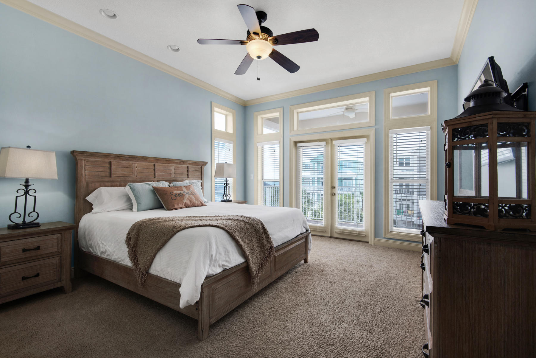 26 Nature Way, Unit 2004 Santa Rosa Beach, FL 32459 - Photo 14 of 65 a spacious bedroom with a bed and a chandelier