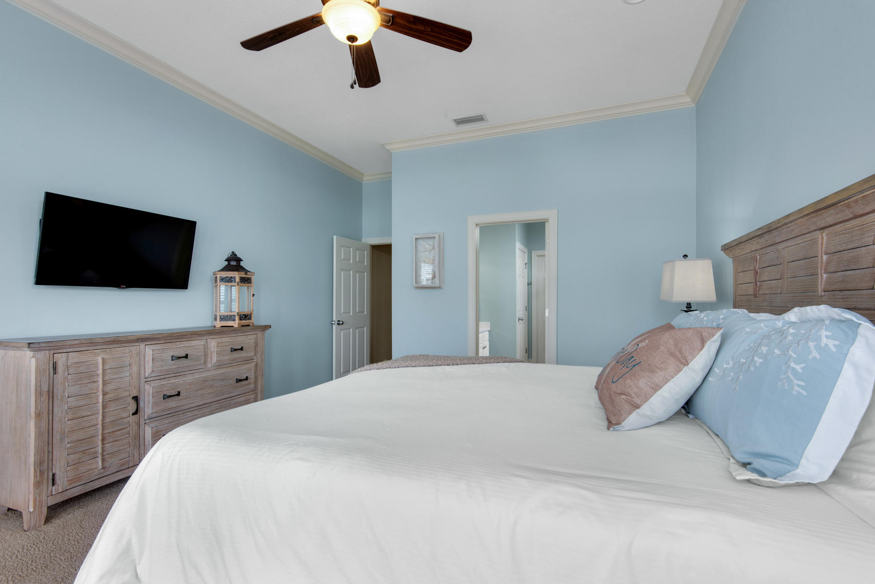 26 Nature Way, Unit 2004 Santa Rosa Beach, FL 32459 - Photo 17 of 65 a bedroom with a bed and a flat screen tv