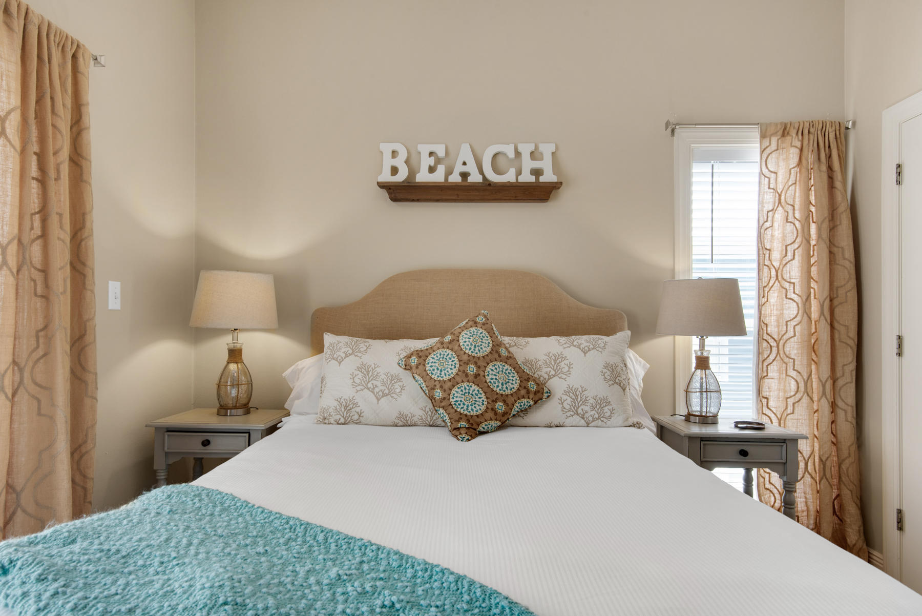 26 Nature Way, Unit 2004 Santa Rosa Beach, FL 32459 - Photo 25 of 65 a bedroom with a bed and window