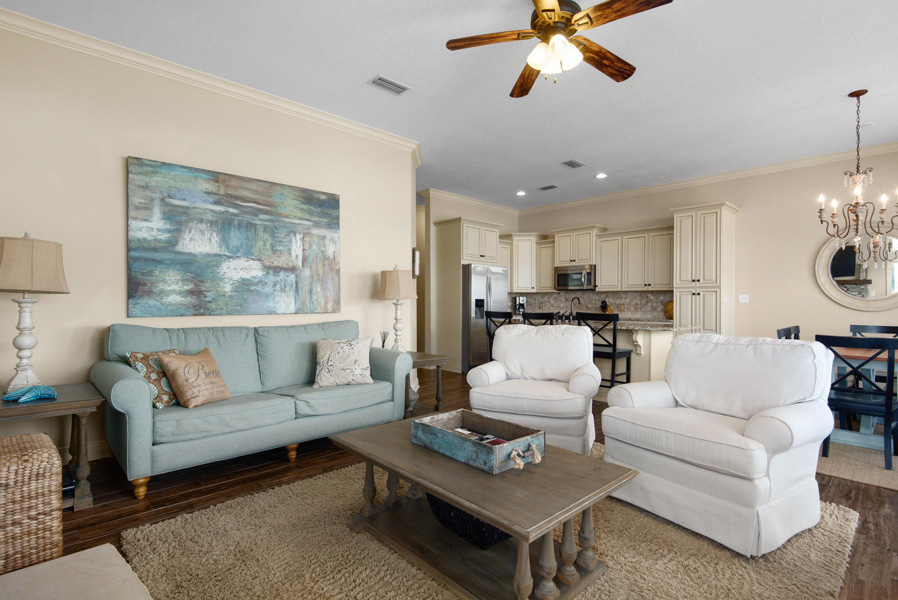 26 Nature Way, Unit 2004 Santa Rosa Beach, FL 32459 - Photo 6 of 65 a living room with furniture and a chandelier