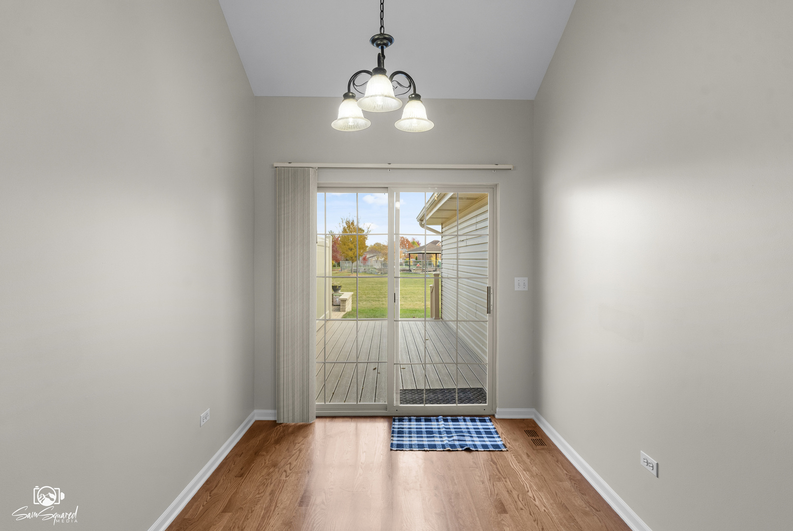 1431 Coral Bell Drive Joliet, IL 60435 - Photo 11 of 38 wooden floor in an empty room with a window