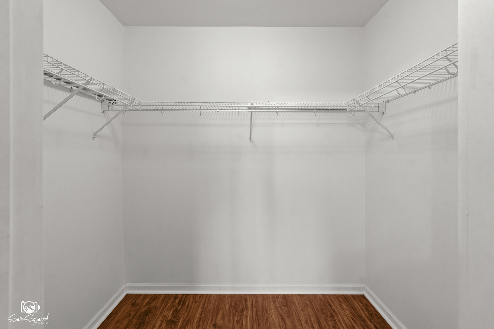 1431 Coral Bell Drive Joliet, IL 60435 - Photo 16 of 38 a view of a room with racks on the wall