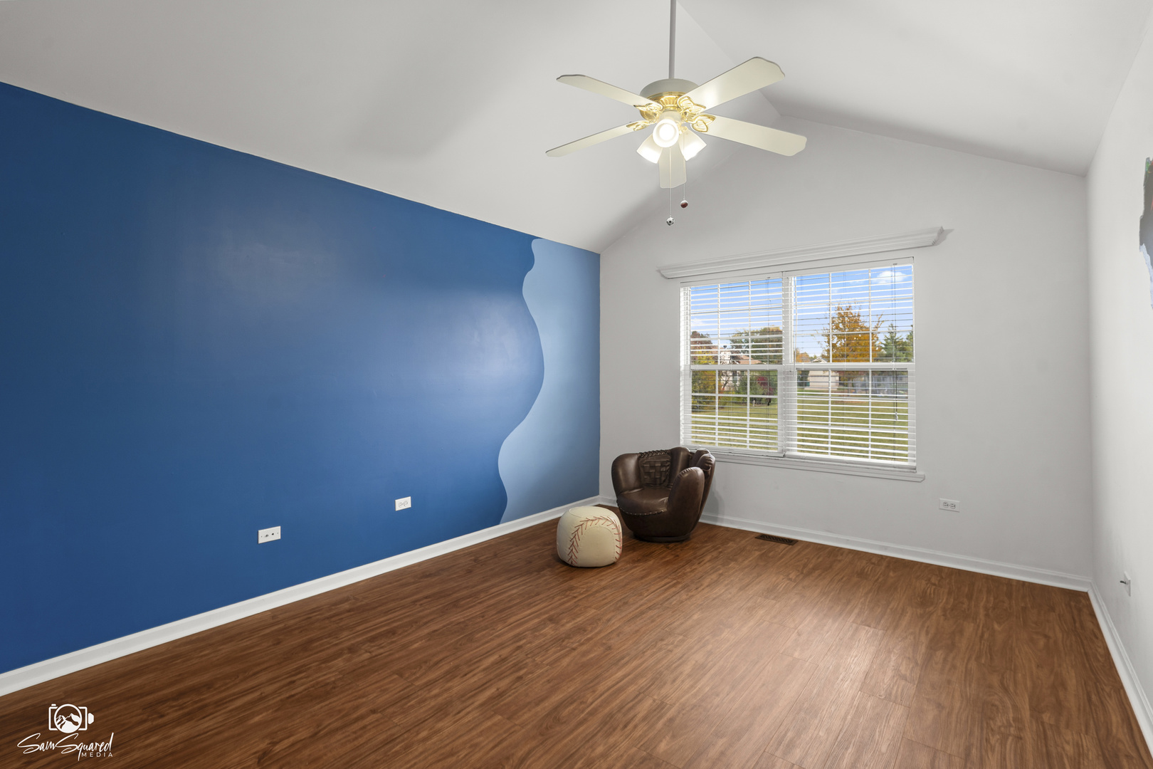 1431 Coral Bell Drive Joliet, IL 60435 - Photo 18 of 38 a view of an empty room with a window and wooden floor
