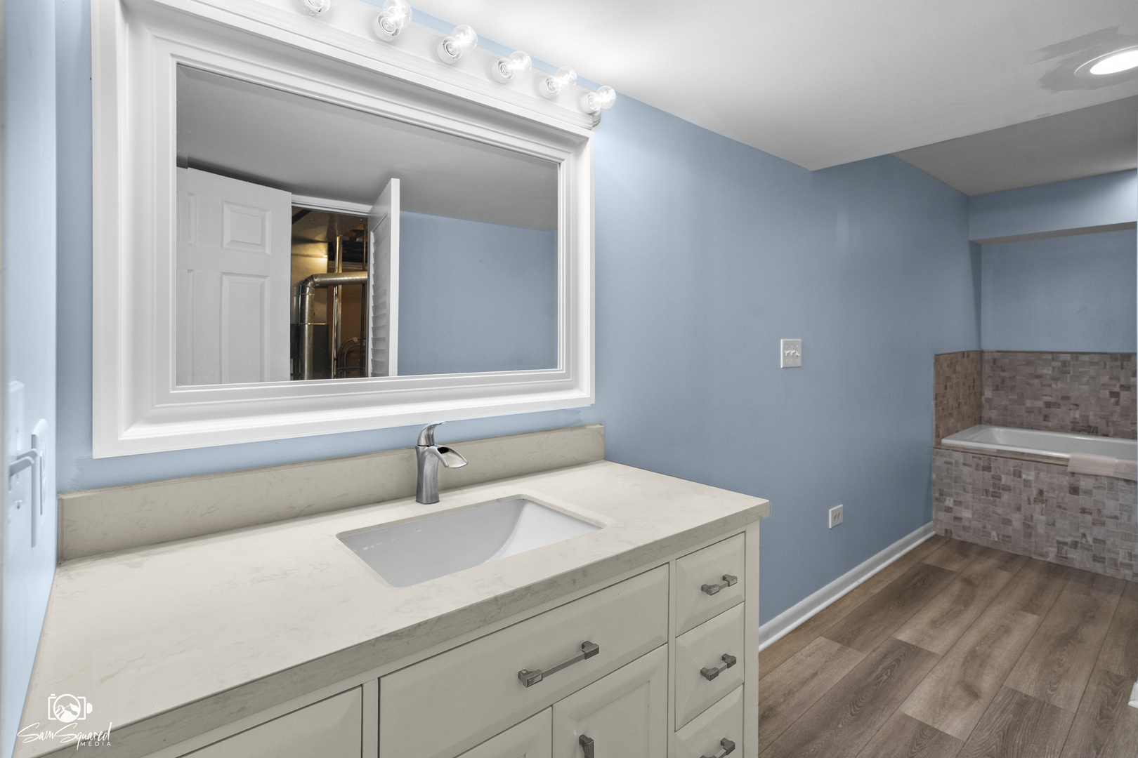 1431 Coral Bell Drive Joliet, IL 60435 - Photo 26 of 38 a bathroom with a sink and a mirror