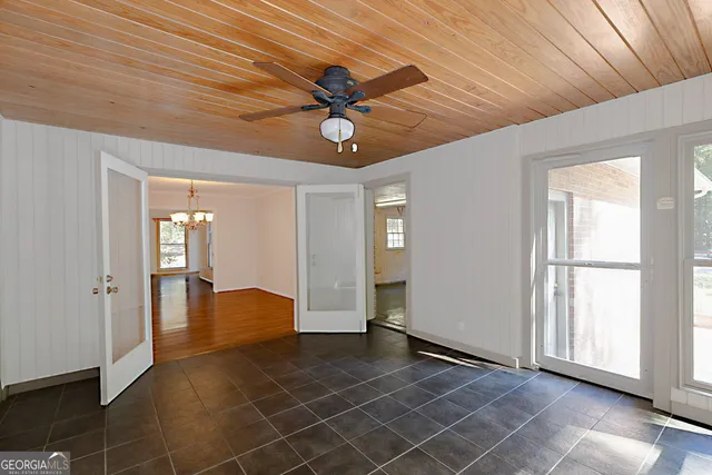 a view of an entryway with a chandelier