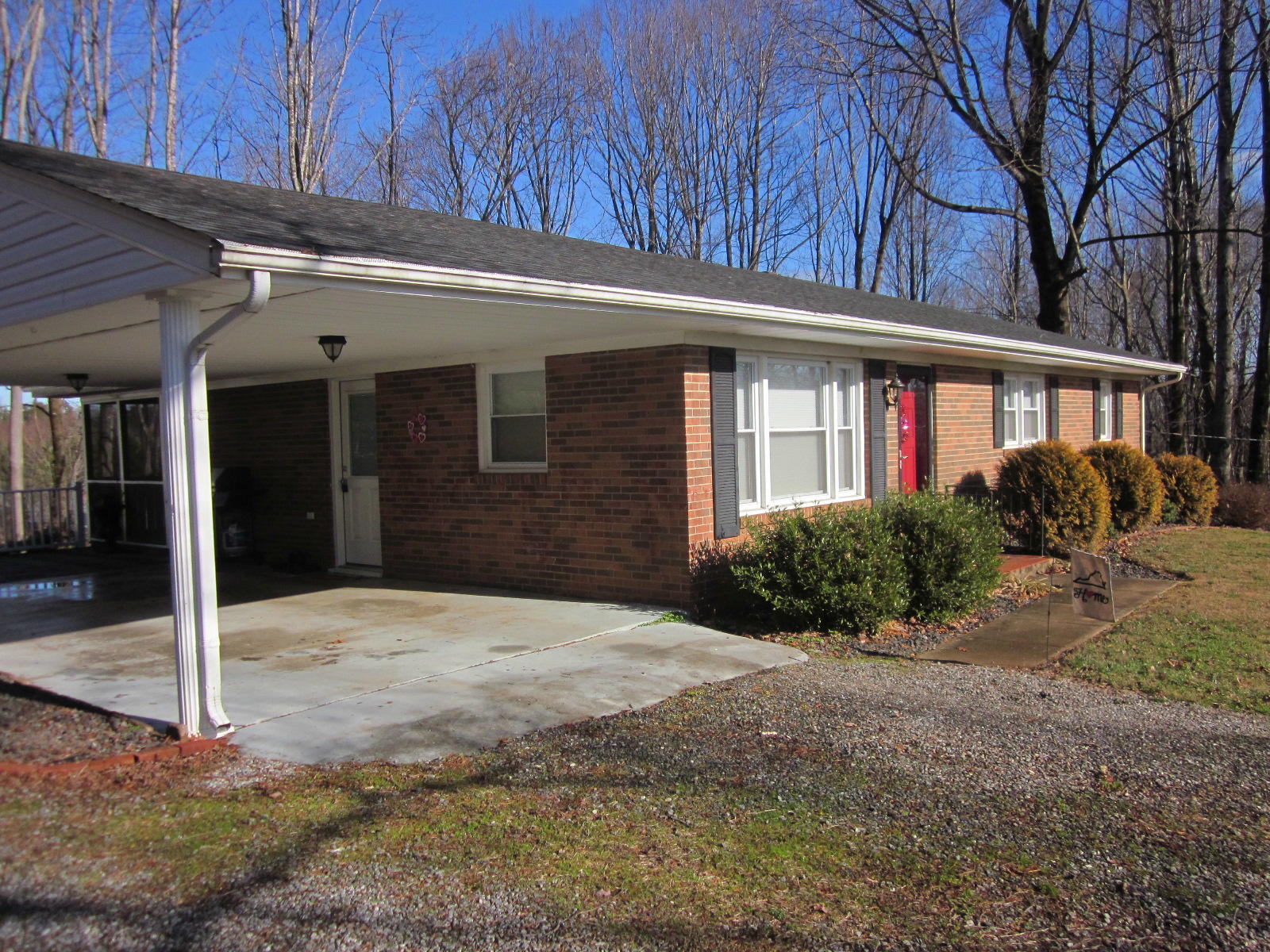 77 Pony Ridge Road Bassett, VA 24055 - Photo 1 of 84 a front view of a house with a yard