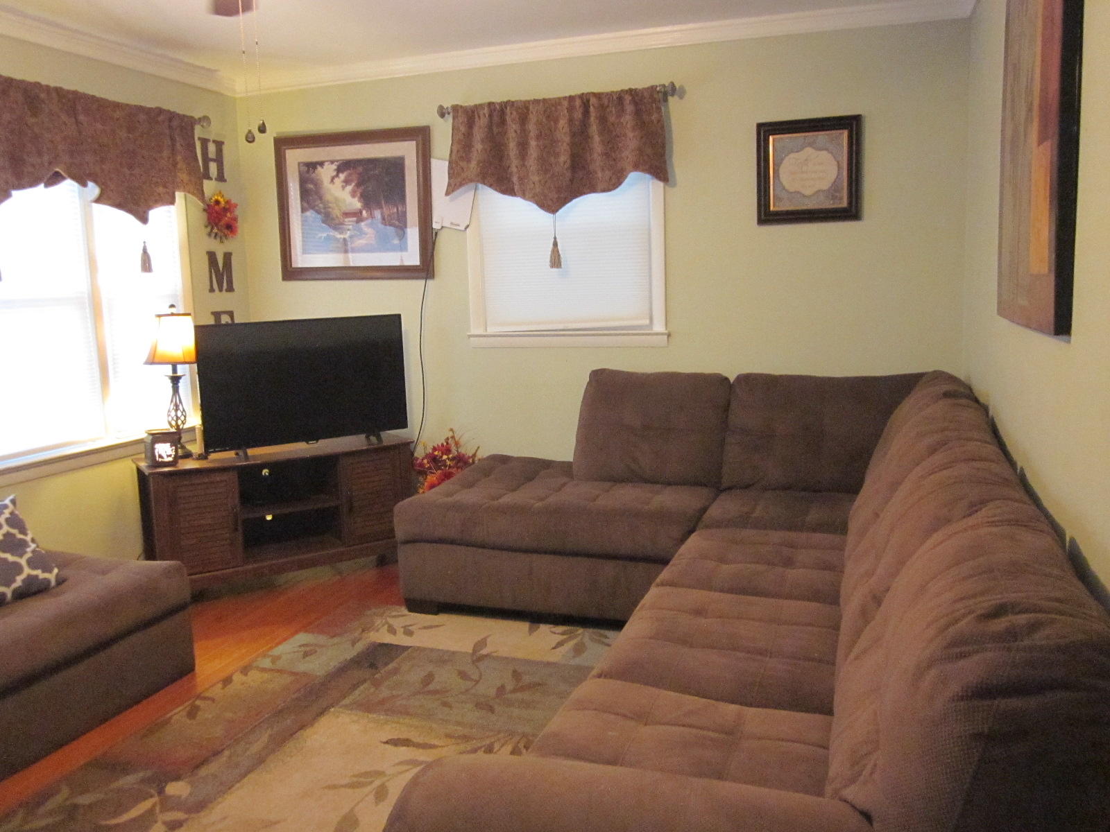 77 Pony Ridge Road Bassett, VA 24055 - Photo 14 of 84 a living room with furniture and a flat screen tv