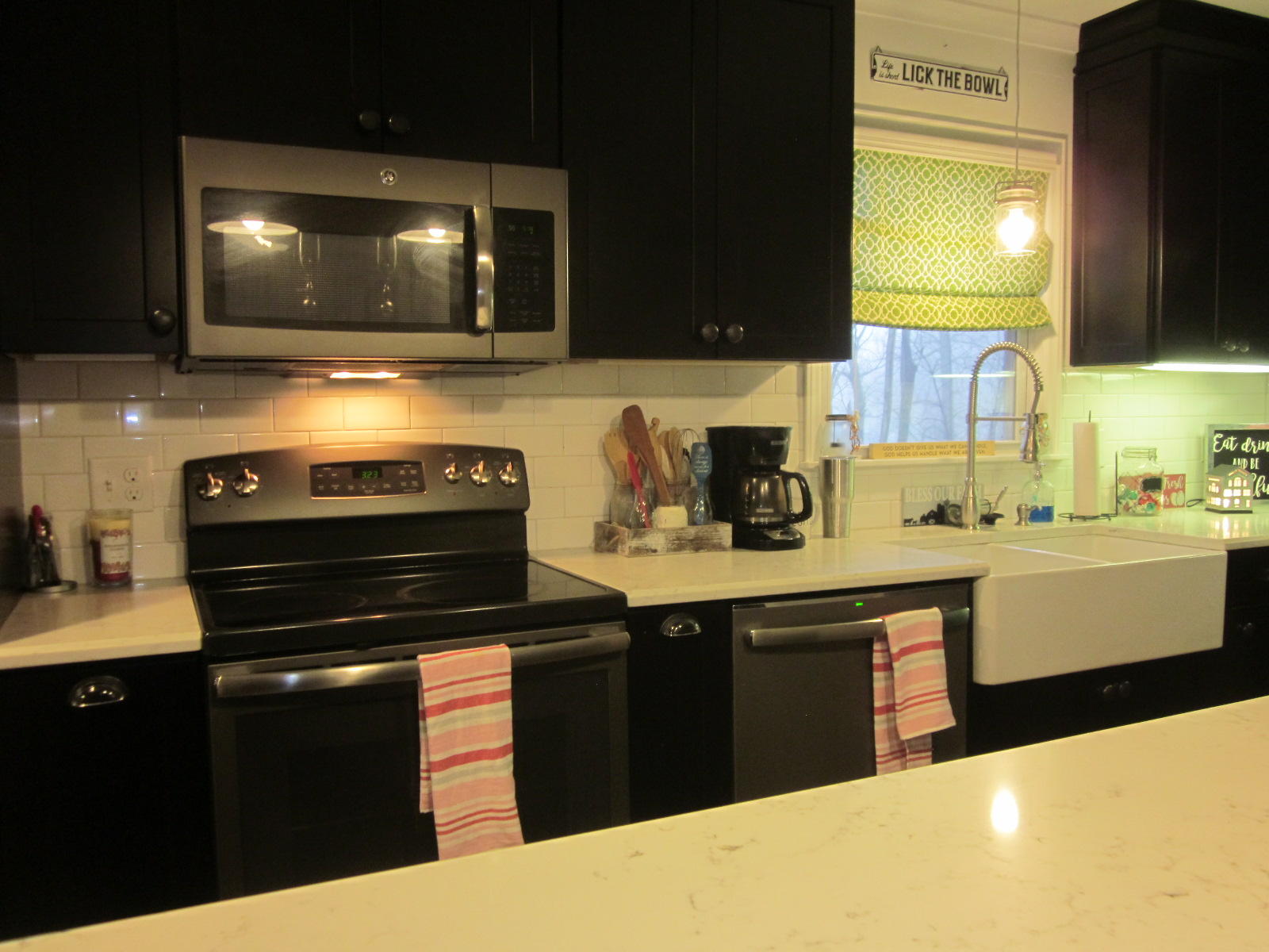77 Pony Ridge Road Bassett, VA 24055 - Photo 29 of 84 a kitchen with stainless steel appliances a stove and a microwave
