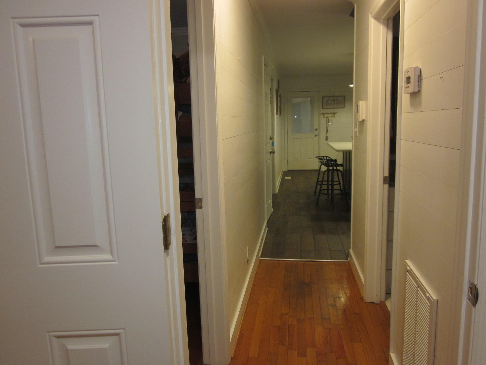 77 Pony Ridge Road Bassett, VA 24055 - Photo 55 of 84 a view of a hallway with a livingroom and a bathroom space